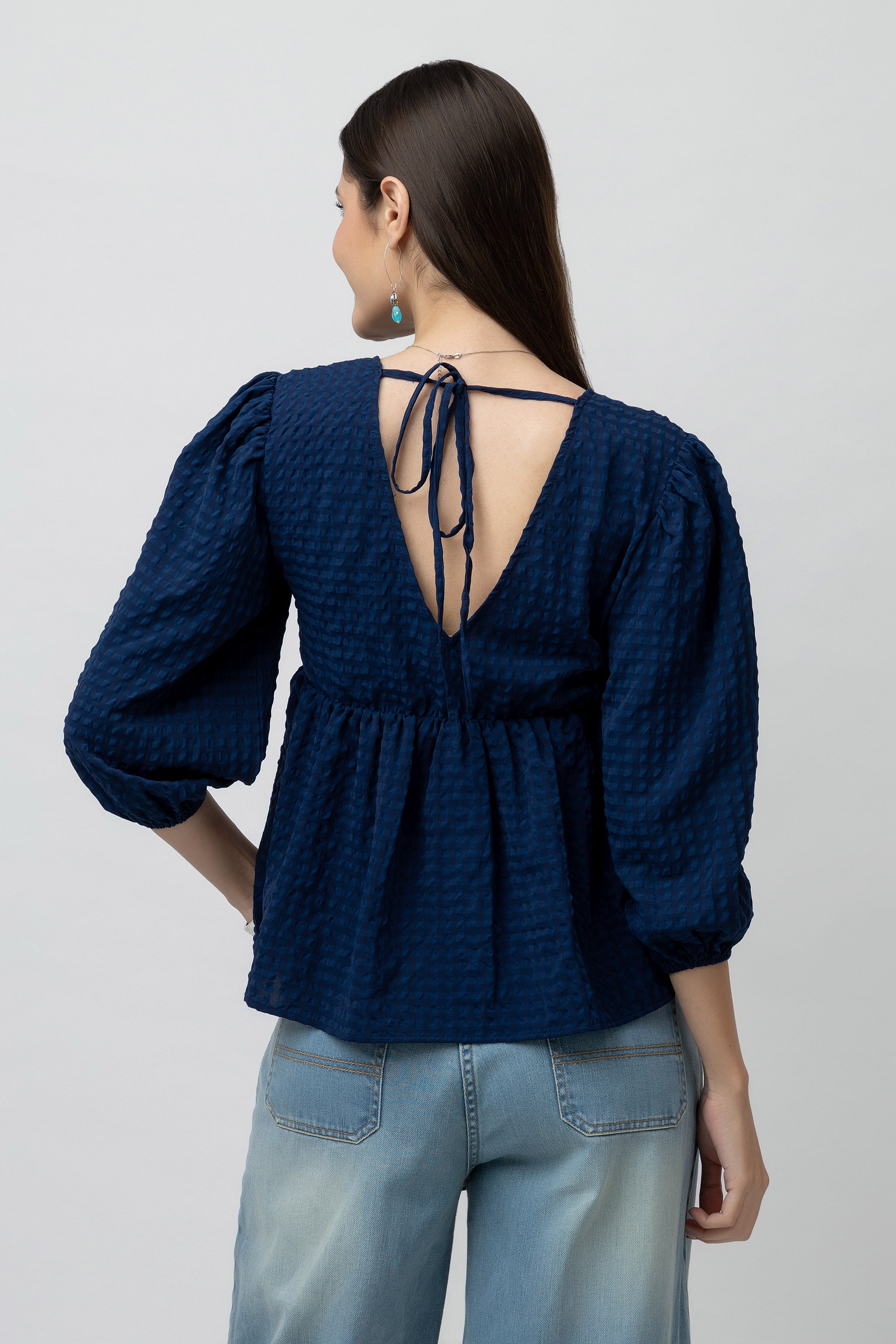 Women's V Neckline Textured Peplum Top